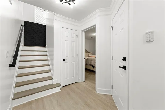 wooden floor with white walls