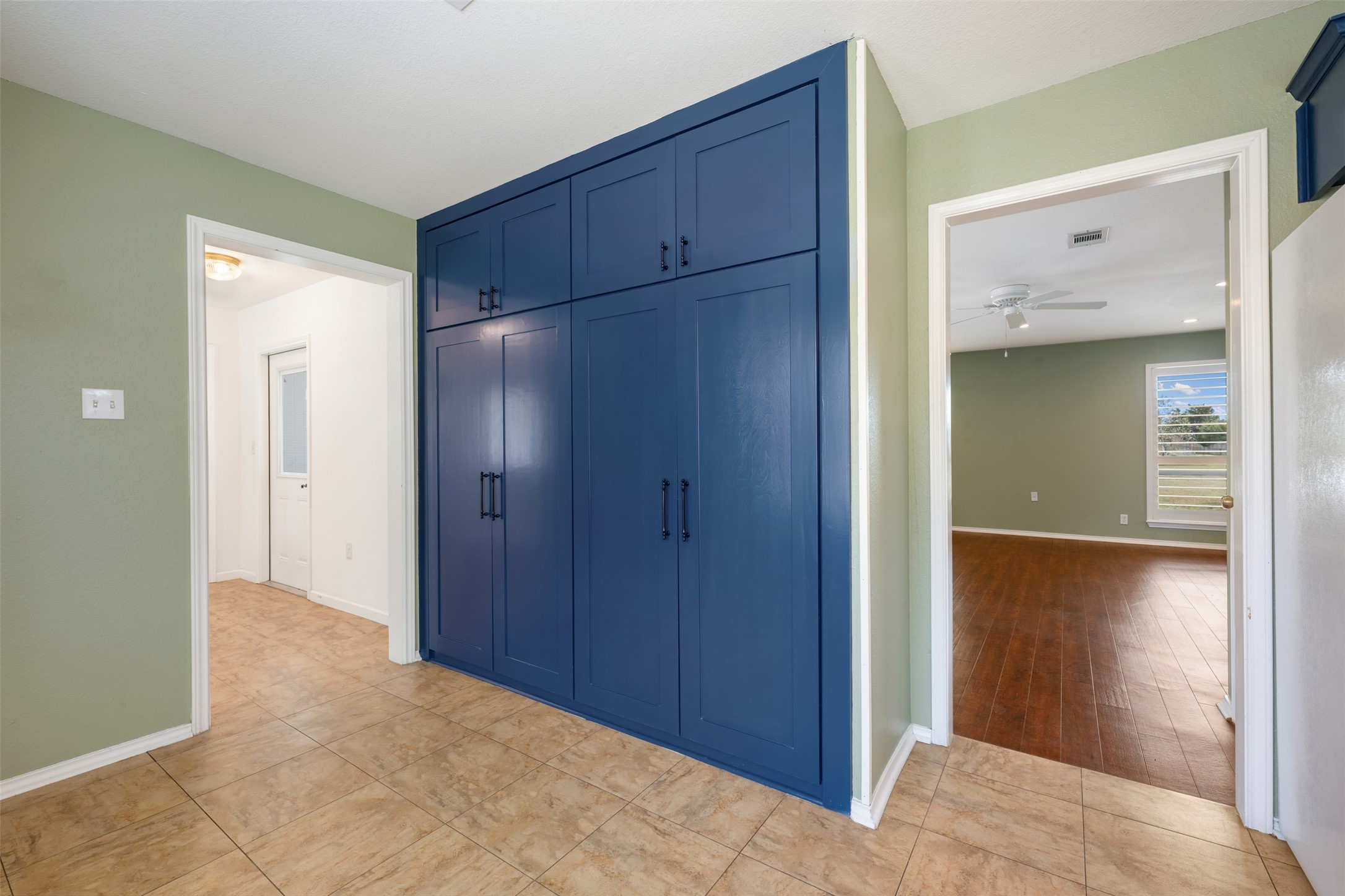104 Sunset Road Georgetown, TX 78633 - Photo 16 of 40 a view of an empty room with closet and wooden floor