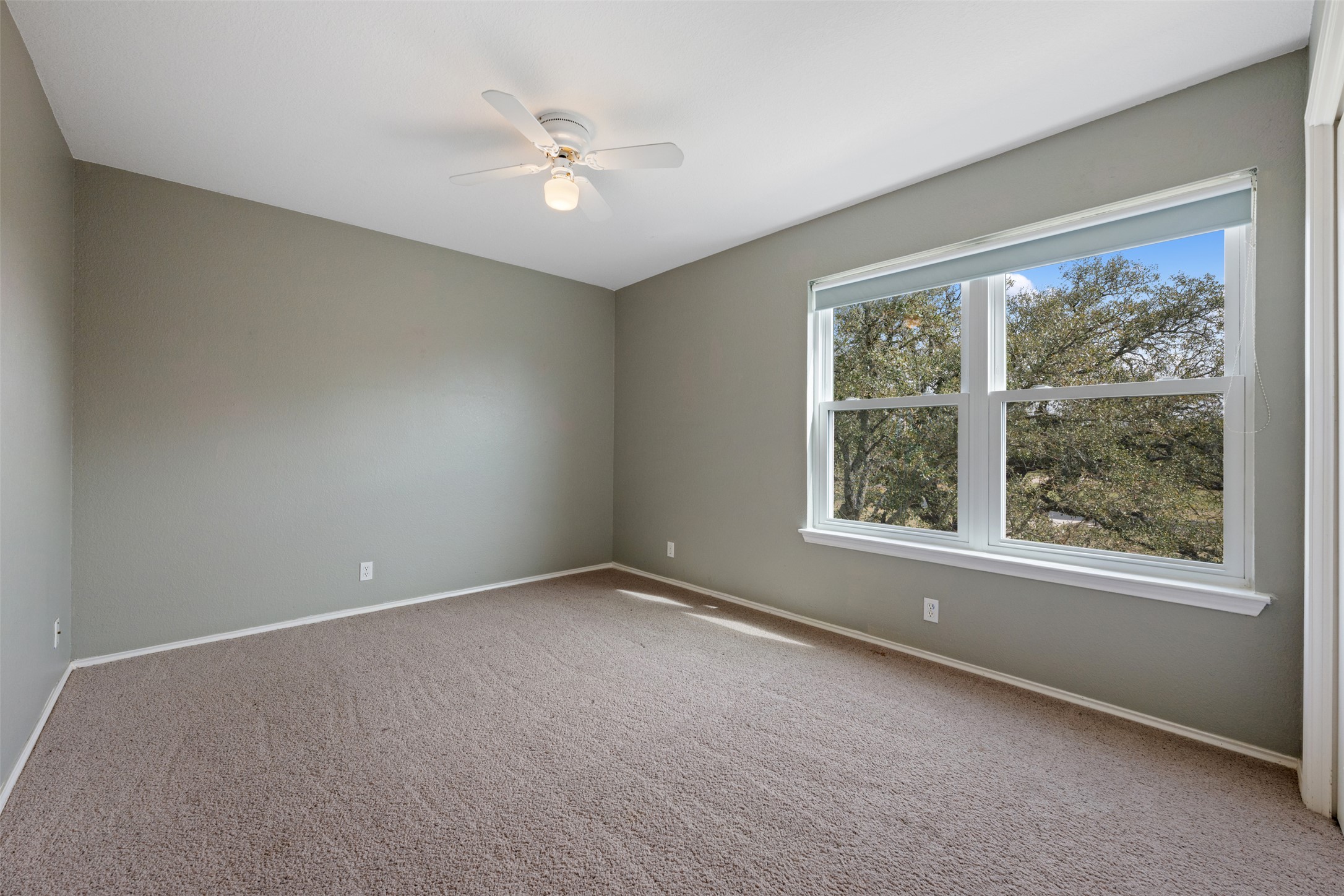 104 Sunset Road Georgetown, TX 78633 - Photo 32 of 40 an empty room with a window