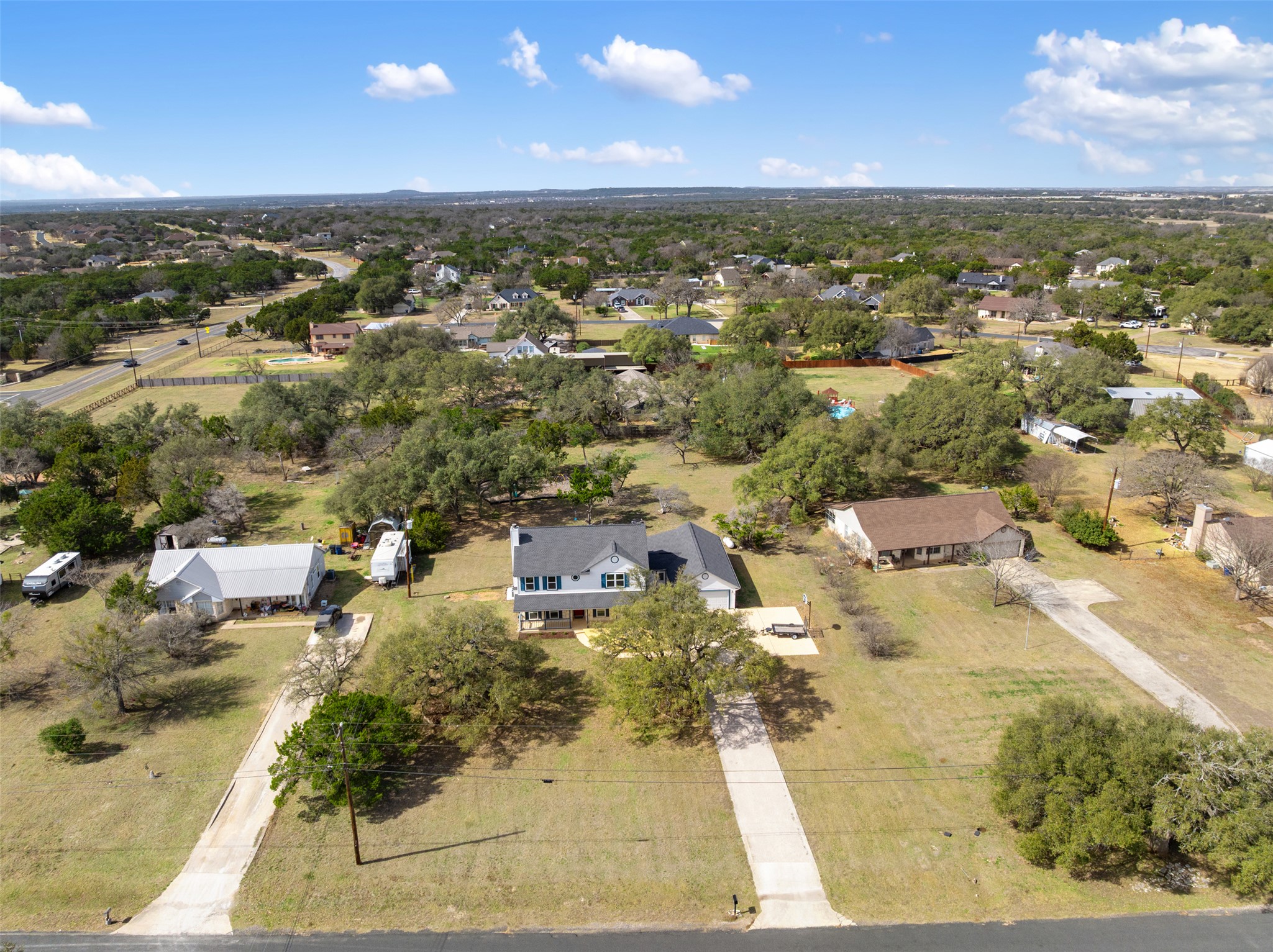 104 Sunset Road Georgetown, TX 78633 - Photo 38 of 40 an aerial view of residential building with parking
