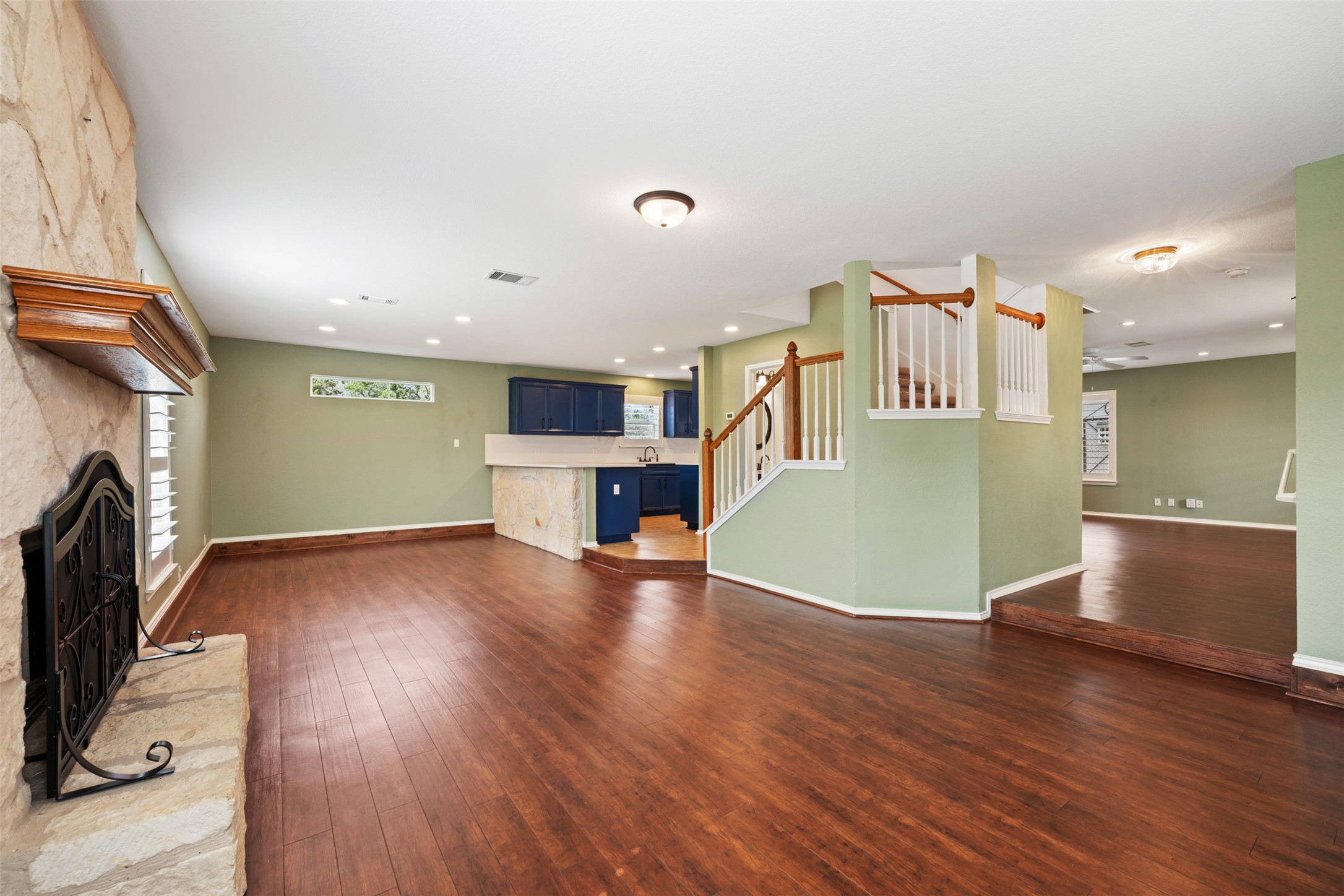 104 Sunset Road Georgetown, TX 78633 - Photo 7 of 40 a view of kitchen and hall with wooden floor
