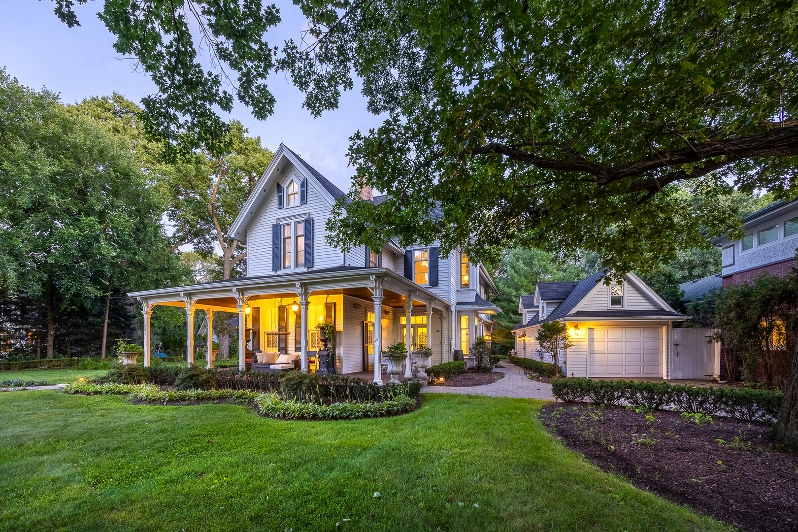 201 Scottswood Road Riverside, IL 60546 - Photo 5 of 32 a view of house with garden and tall trees