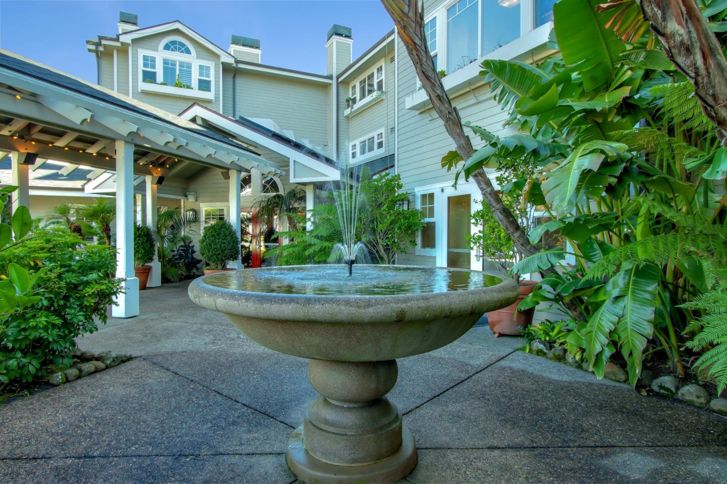 4100 Cabrillo Highway, Unit 105 Half Moon Bay, CA 94019 - Photo 1 of 19 a view of a fountain with plants