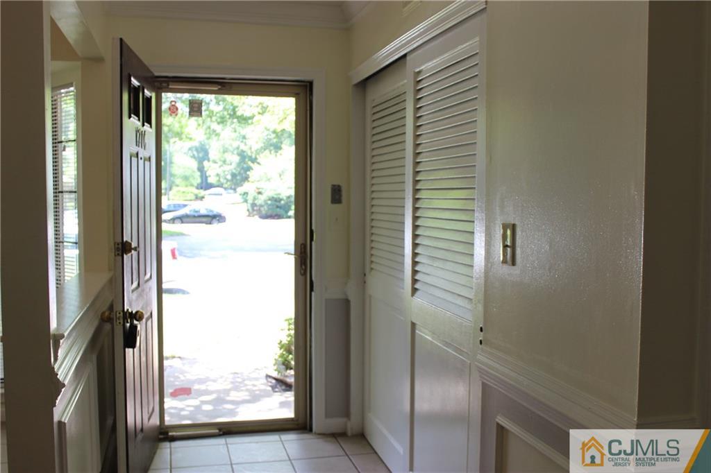 1706 Timber Oaks Road, Unit 1706 Edison, NJ 08820 - Photo 2 of 25 a view of a closet from a window