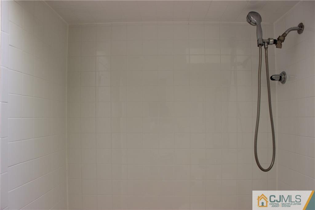 1706 Timber Oaks Road, Unit 1706 Edison, NJ 08820 - Photo 19 of 25 a bathroom with a shower