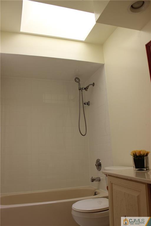 1706 Timber Oaks Road, Unit 1706 Edison, NJ 08820 - Photo 20 of 25 a bathroom with a toilet and a sink