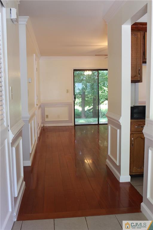 1706 Timber Oaks Road, Unit 1706 Edison, NJ 08820 - Photo 3 of 25 a view of empty room with wooden floor and fan