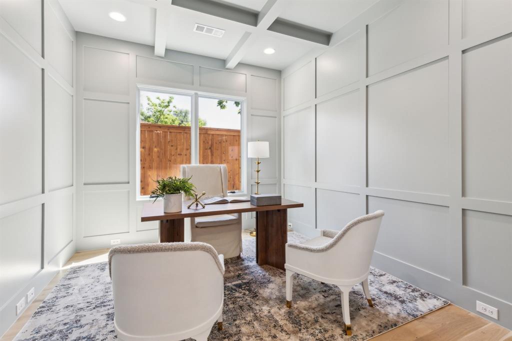 7611 Caillet Street Dallas, TX 75209 - Photo 12 of 37 a living room with furniture a large window and a chandelier