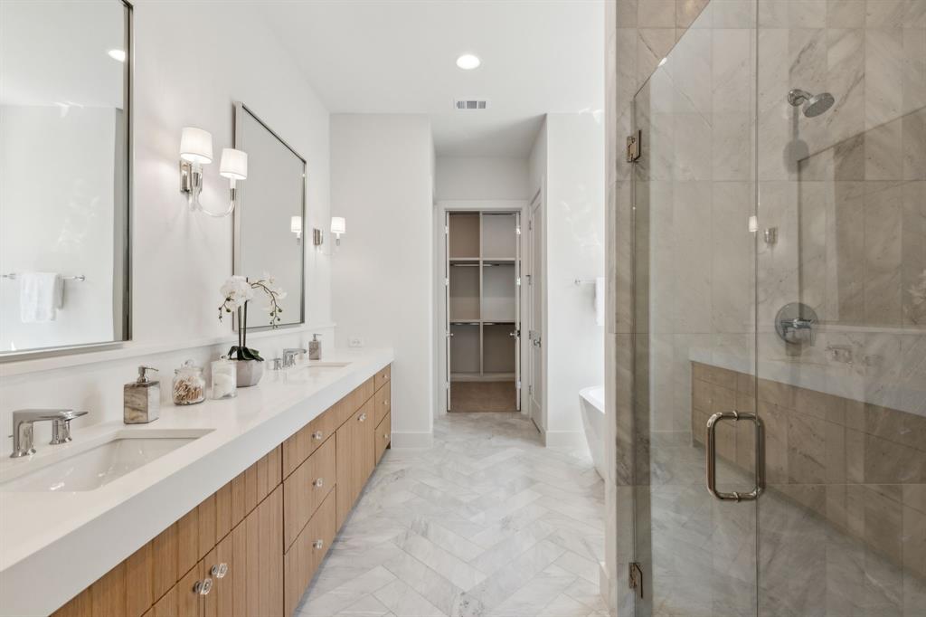 7611 Caillet Street Dallas, TX 75209 - Photo 20 of 37 a bathroom with a double vanity sink mirror and shower