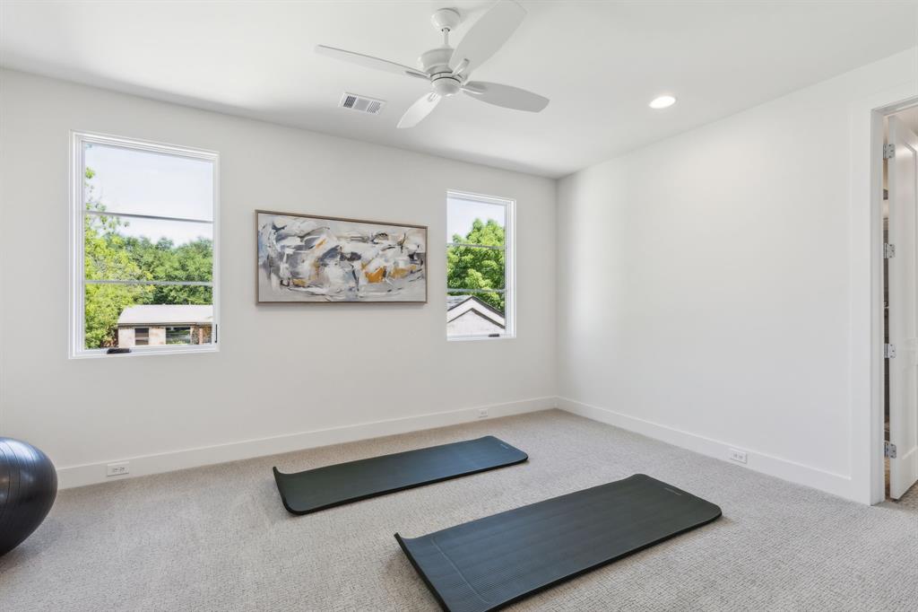 7611 Caillet Street Dallas, TX 75209 - Photo 26 of 37 an empty room with windows