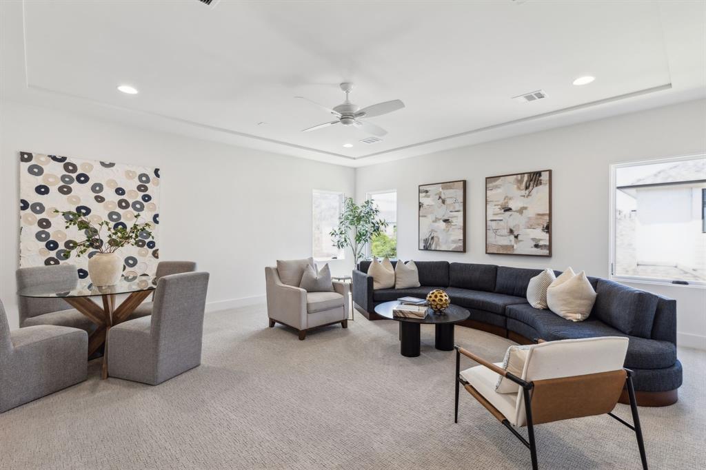 7611 Caillet Street Dallas, TX 75209 - Photo 27 of 37 a living room with furniture and a potted plant