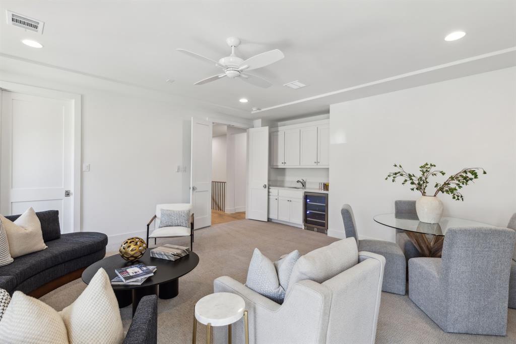 7611 Caillet Street Dallas, TX 75209 - Photo 28 of 37 a living room with furniture kitchen view and a dining table