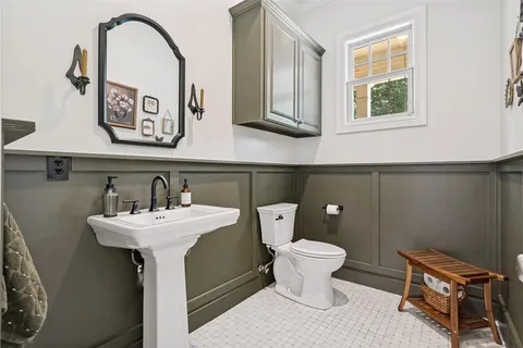 a bathroom with a sink and a toilet