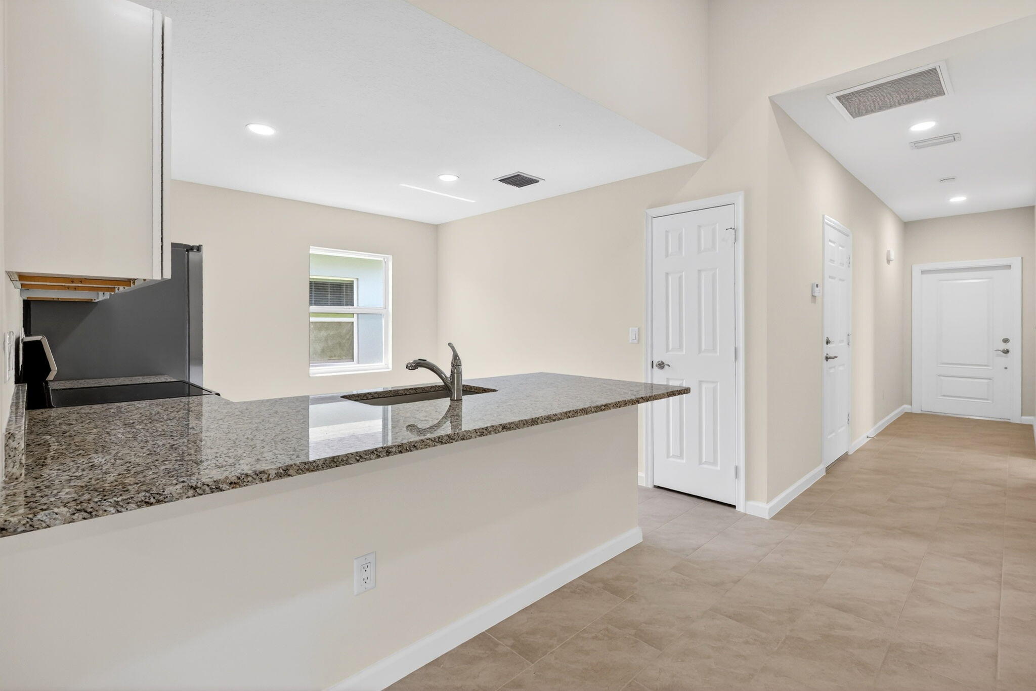 134 Southwest Seminole Crossing Southwest Indiantown, FL 34956 - Photo 8 of 27 134 KITCHEN 2