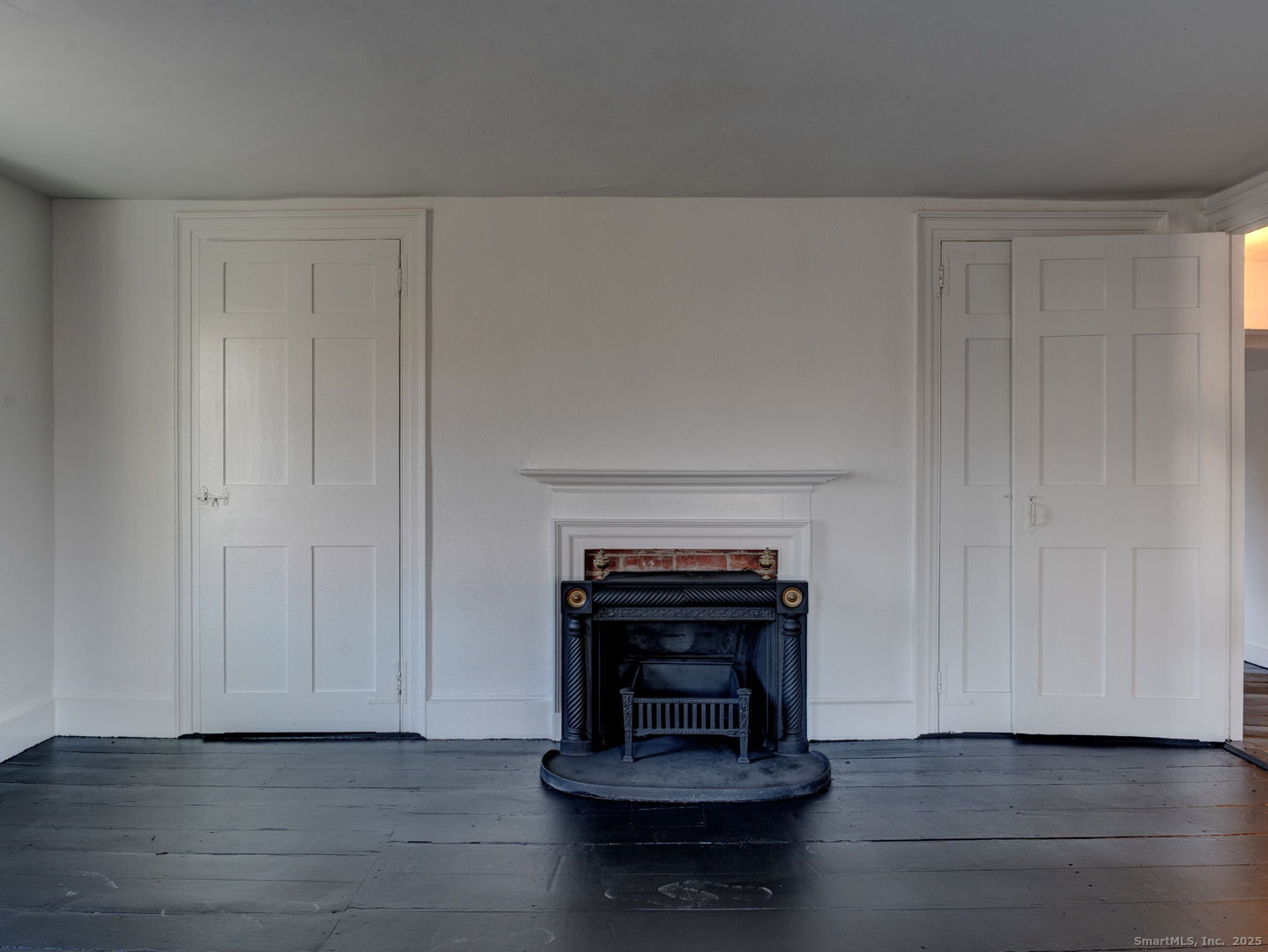 668 Middle Turnpike Mansfield, CT 06268 - Photo 21 of 40 a living room with furniture and a fireplace