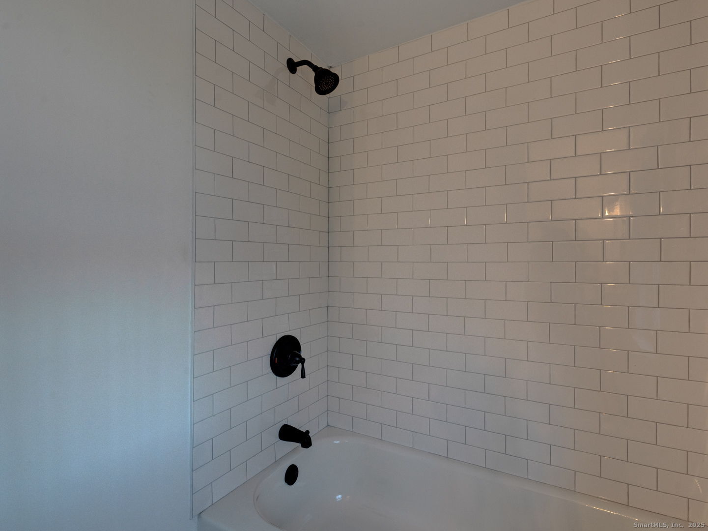 668 Middle Turnpike Mansfield, CT 06268 - Photo 25 of 40 a bathroom with a shower