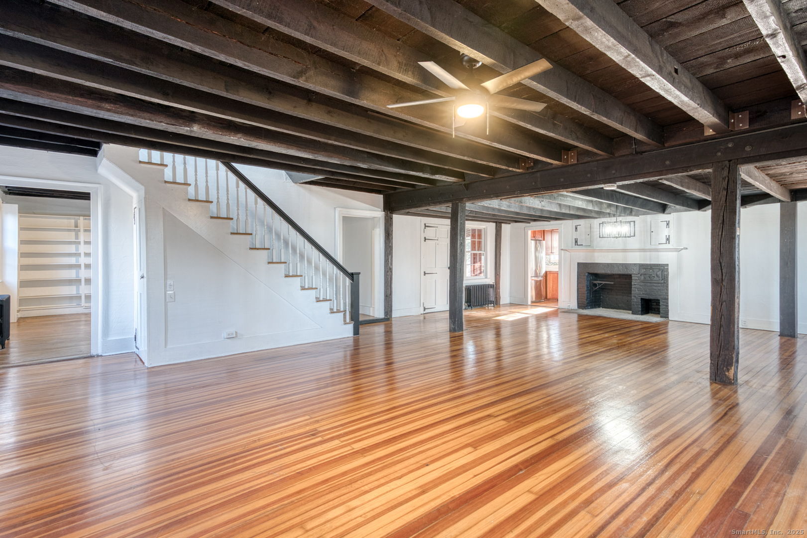 668 Middle Turnpike Mansfield, CT 06268 - Photo 29 of 40 a view of empty room with wooden floor