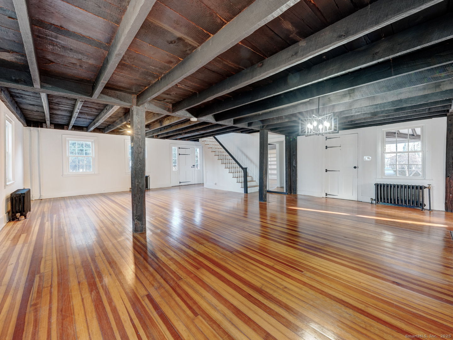 668 Middle Turnpike Mansfield, CT 06268 - Photo 5 of 40 a view of a hallway with wooden floor