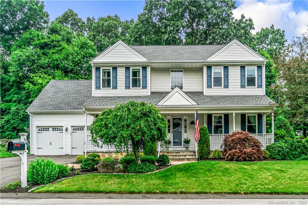 66 Old Colony Road, Unit 66 Monroe, CT 06468 - Photo 1 of 1 a front view of a house with a yard