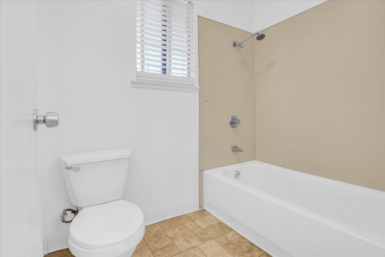 2200 Kimwood Lane Rancho Cordova, CA 95670 - Photo 15 of 26 a white toilet sitting next to a bath tub
