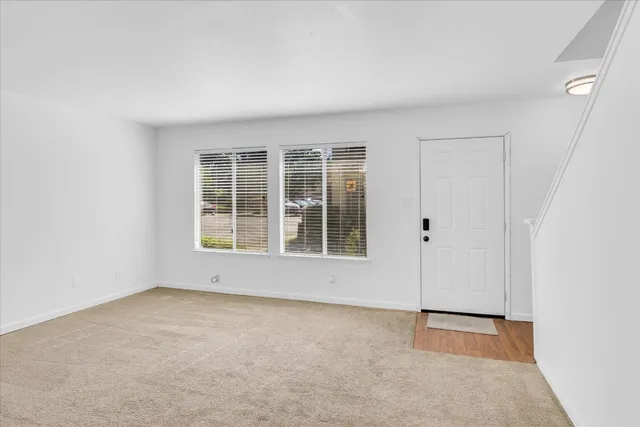 an empty room with windows