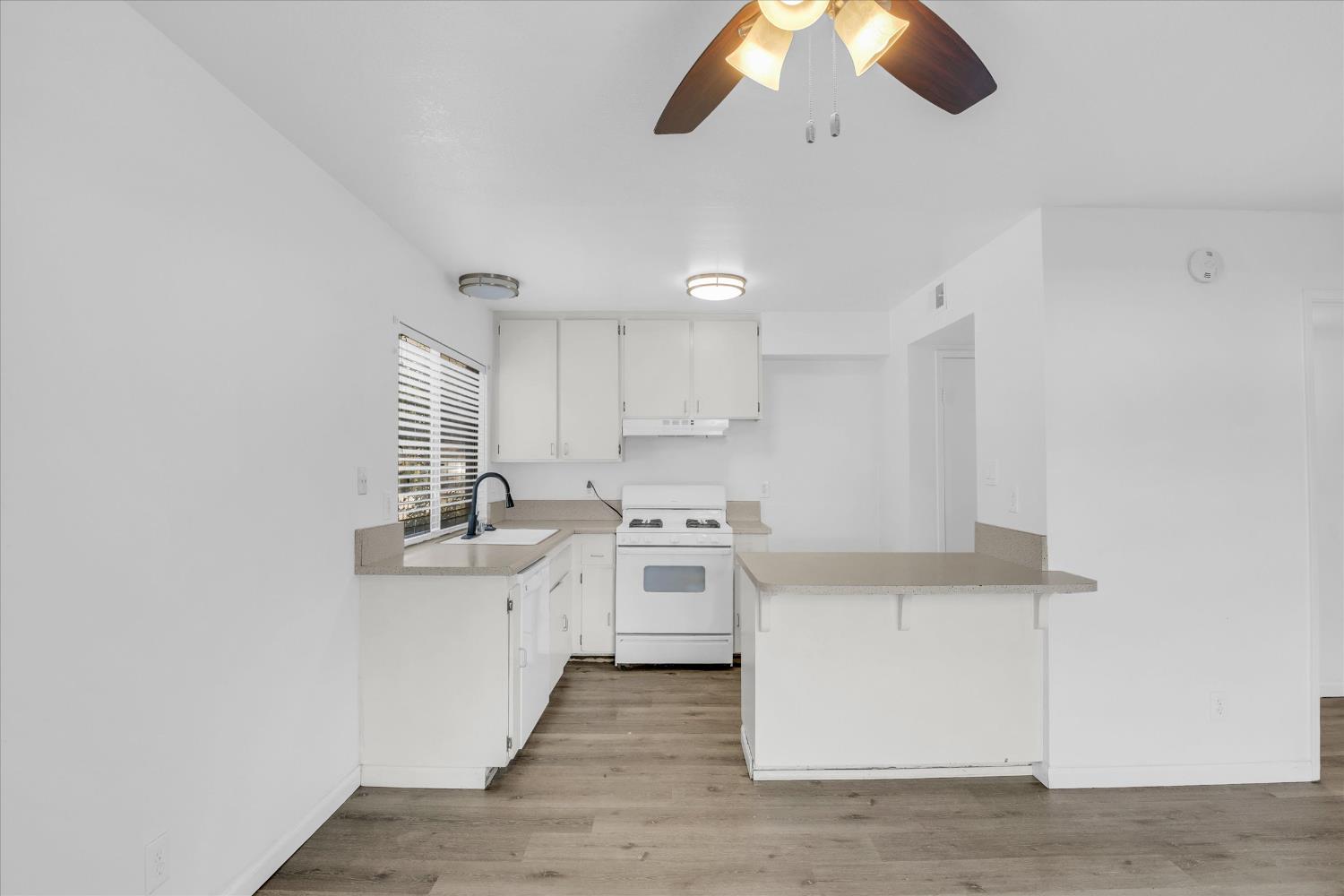 2200 Kimwood Lane Rancho Cordova, CA 95670 - Photo 9 of 26 a kitchen with cabinets a sink and appliances