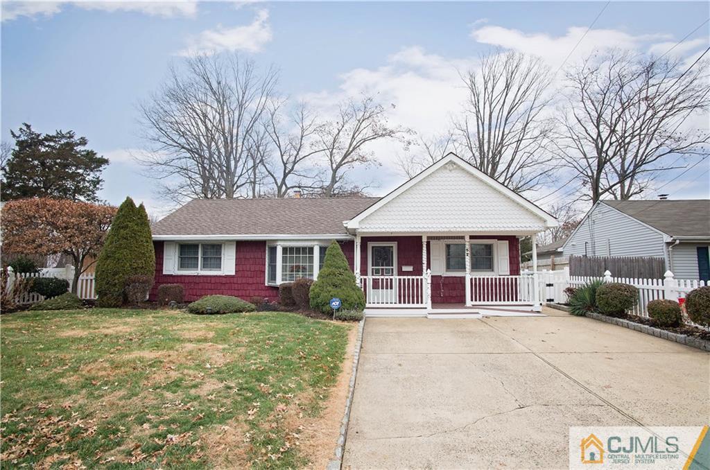 52 Idlewild Road Edison, NJ 08817 - Photo 1 of 21 front view of a house with a yard