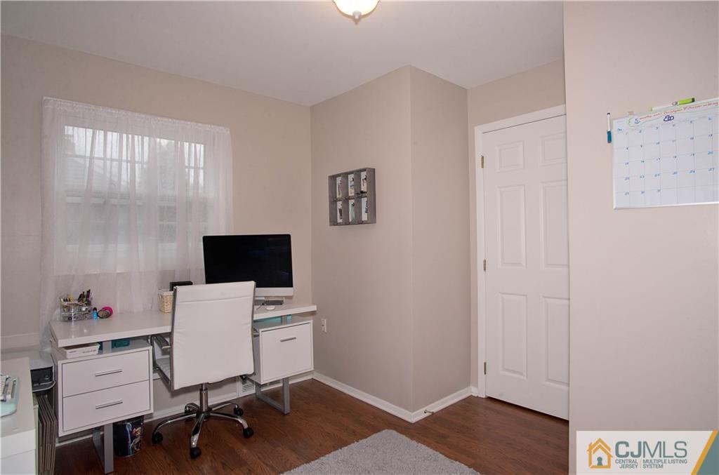 52 Idlewild Road Edison, NJ 08817 - Photo 14 of 21 a view of a workspace with furniture and a window