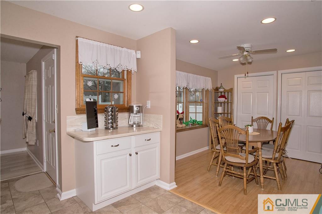 52 Idlewild Road Edison, NJ 08817 - Photo 8 of 21 a dining room with furniture and window