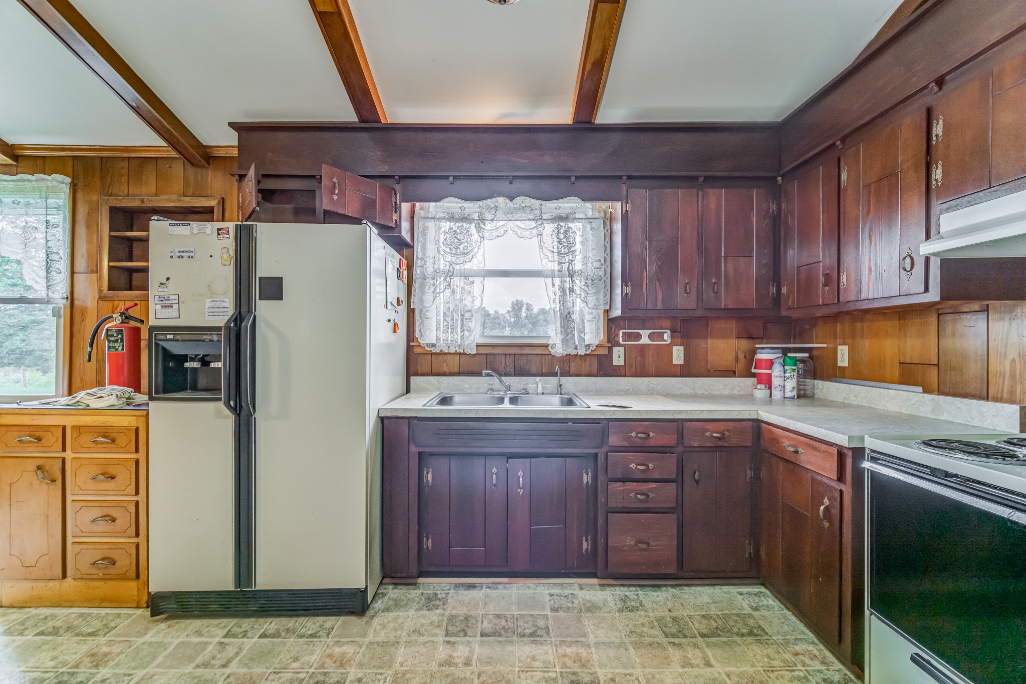 1377 Deal Road Burns, TN 37029 - Photo 20 of 47 a kitchen with refrigerator cabinets and a sink