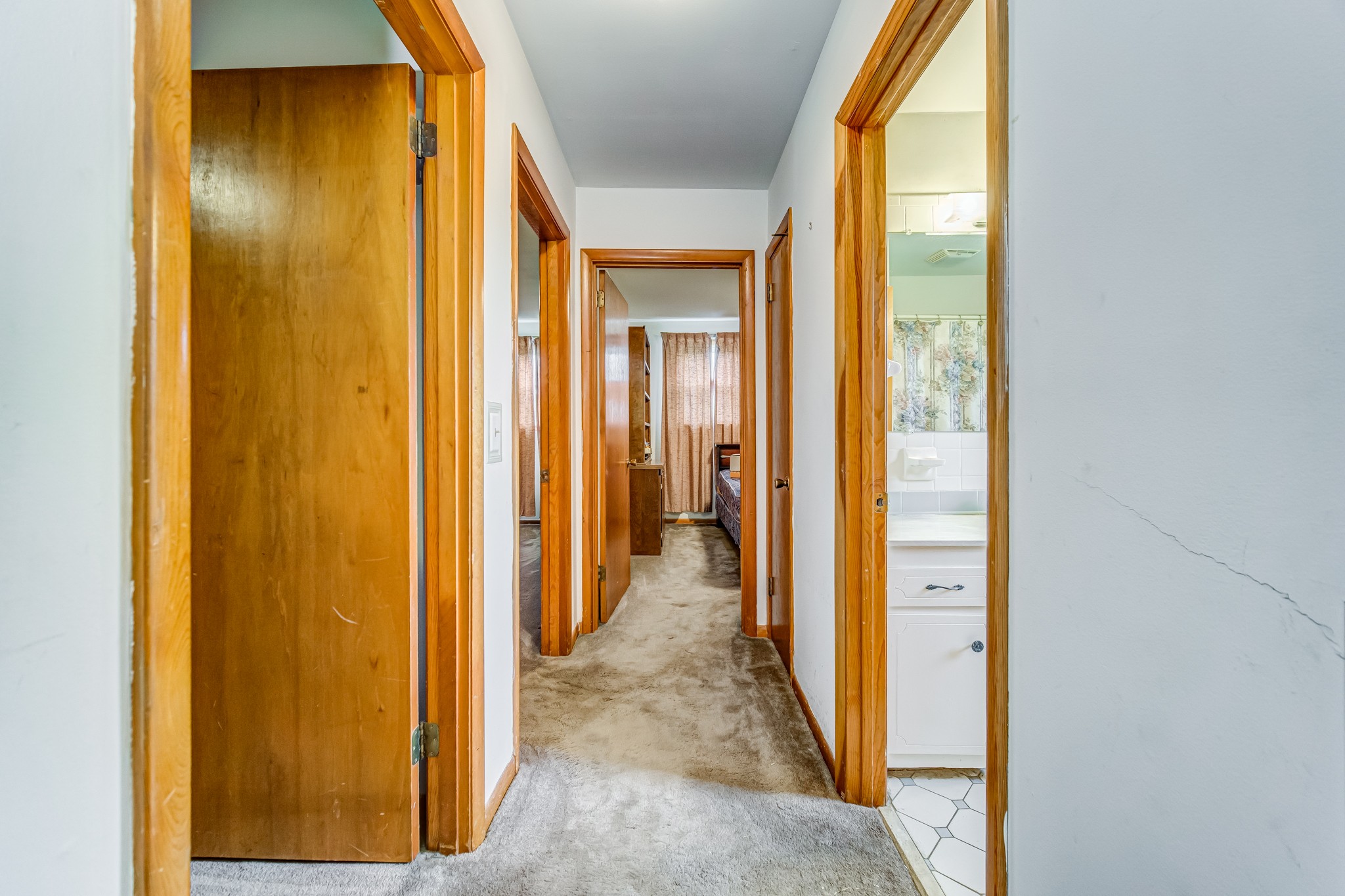 1377 Deal Road Burns, TN 37029 - Photo 23 of 47 a view of a hallway with a door and couch