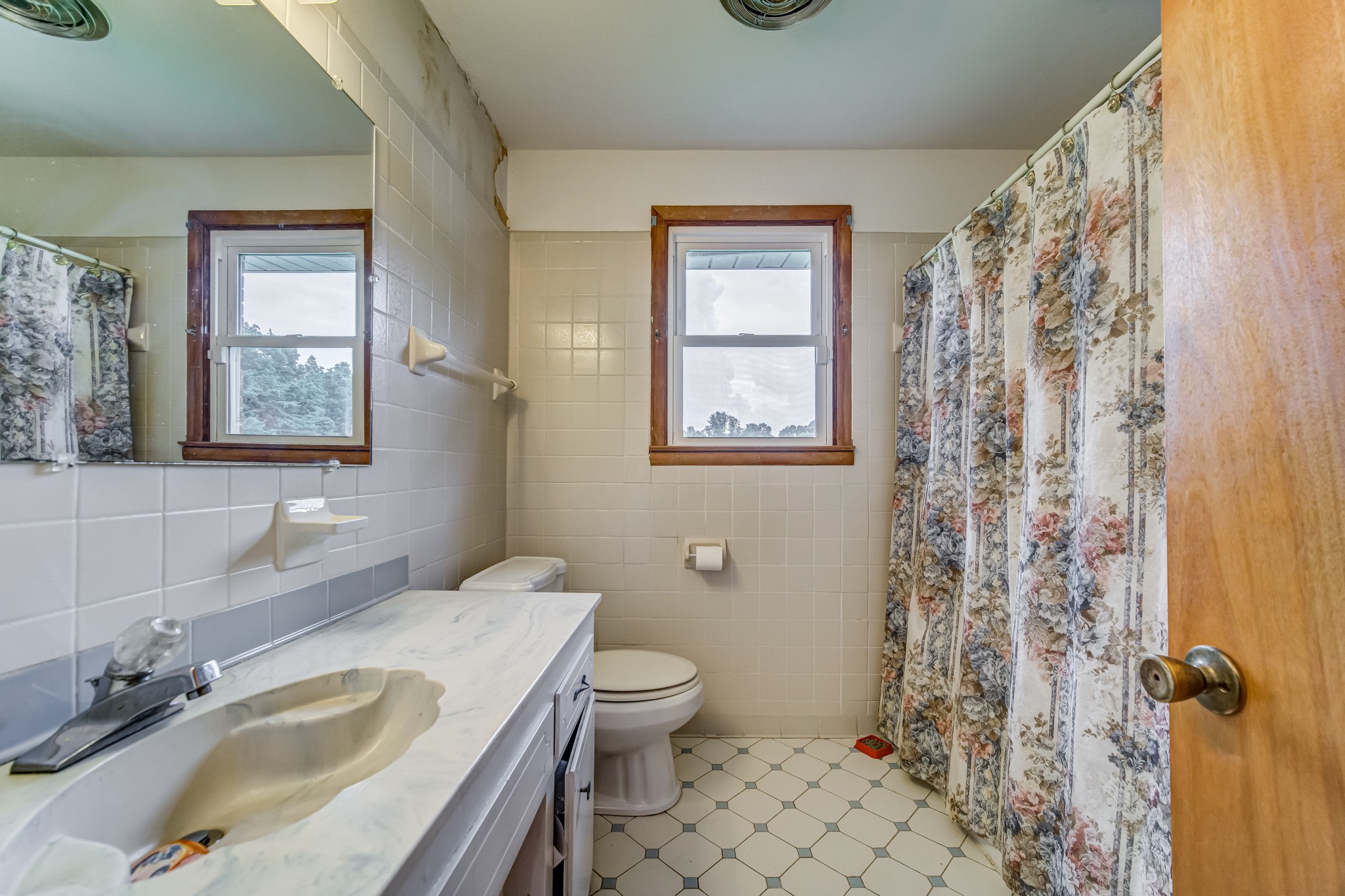 1377 Deal Road Burns, TN 37029 - Photo 27 of 47 a bathroom with a sink toilet and shower