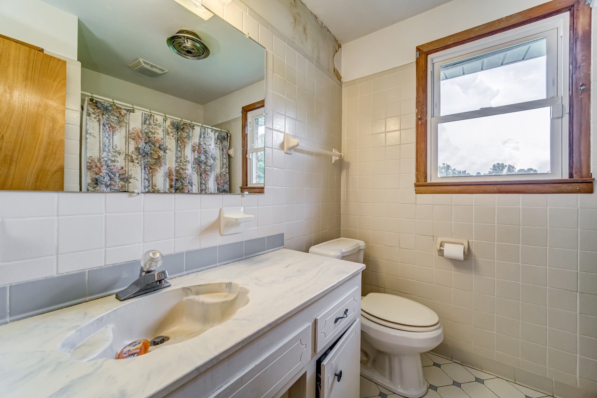 1377 Deal Road Burns, TN 37029 - Photo 28 of 47 a bathroom with a granite countertop sink mirror and a toilet