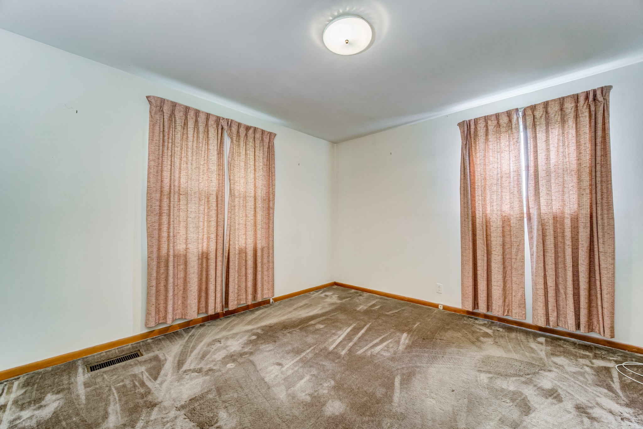 1377 Deal Road Burns, TN 37029 - Photo 31 of 47 an empty room with windows