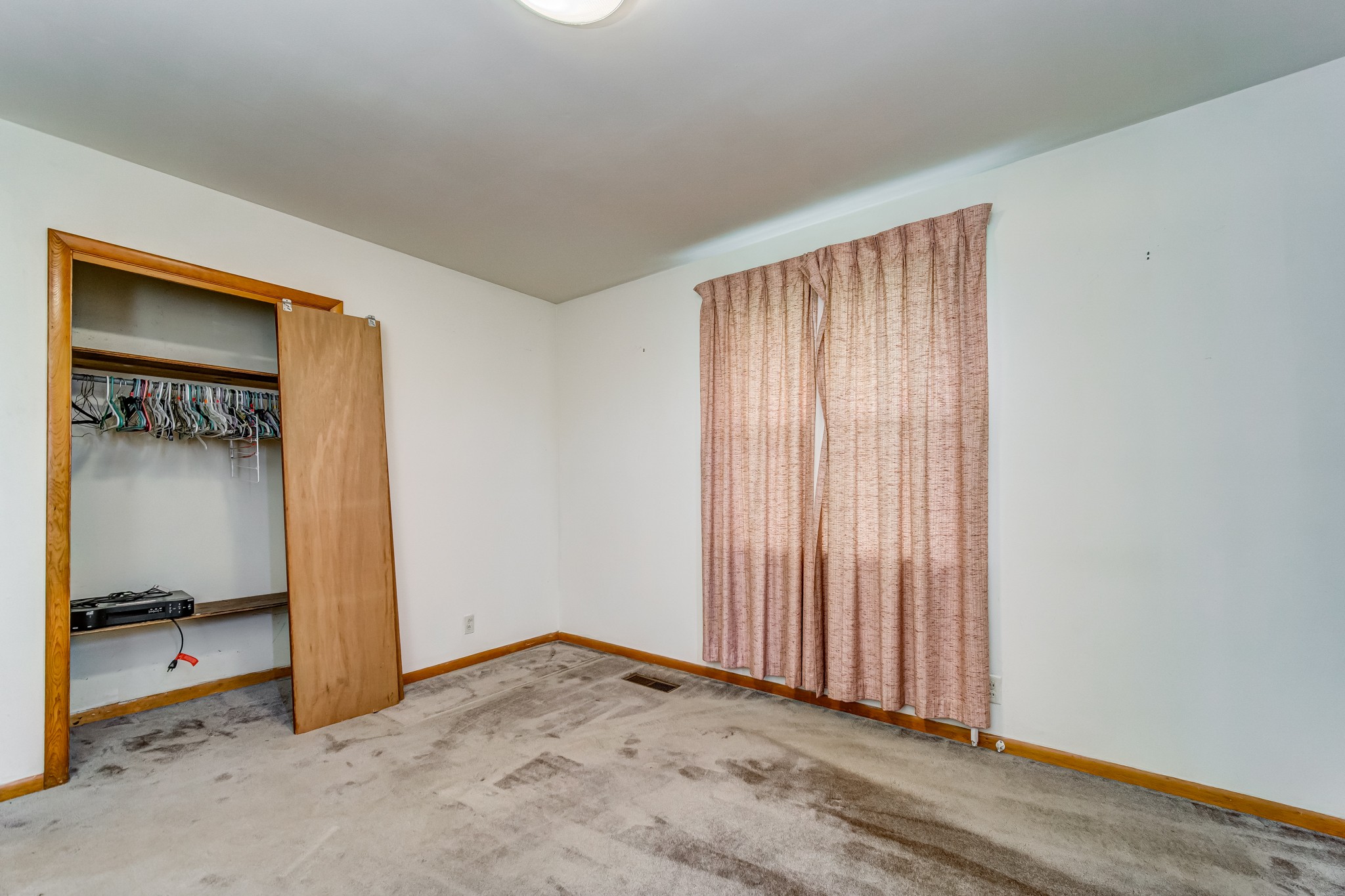 1377 Deal Road Burns, TN 37029 - Photo 33 of 47 an empty room with a door