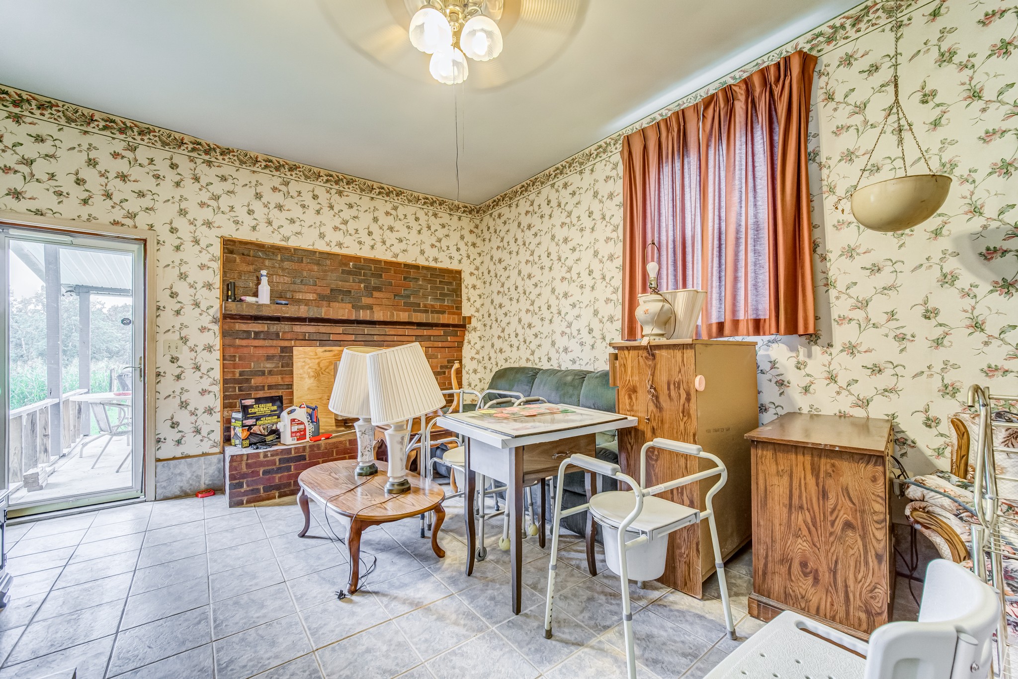 1377 Deal Road Burns, TN 37029 - Photo 35 of 47 a view of a dining room with furniture and a large window