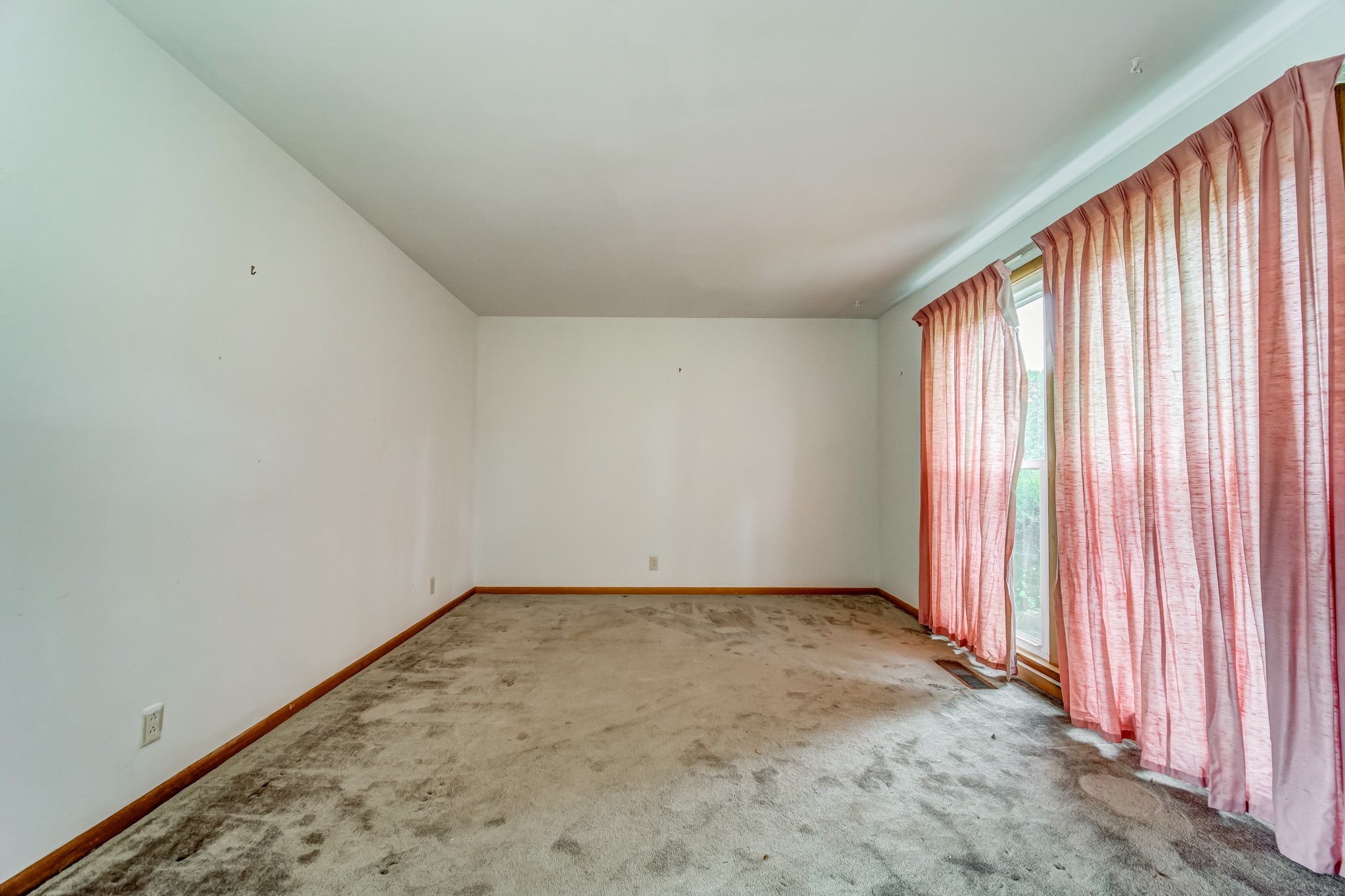 1377 Deal Road Burns, TN 37029 - Photo 7 of 47 an empty room with a window