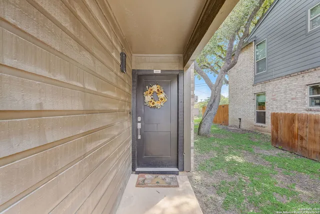 a view of an entryway with a garden