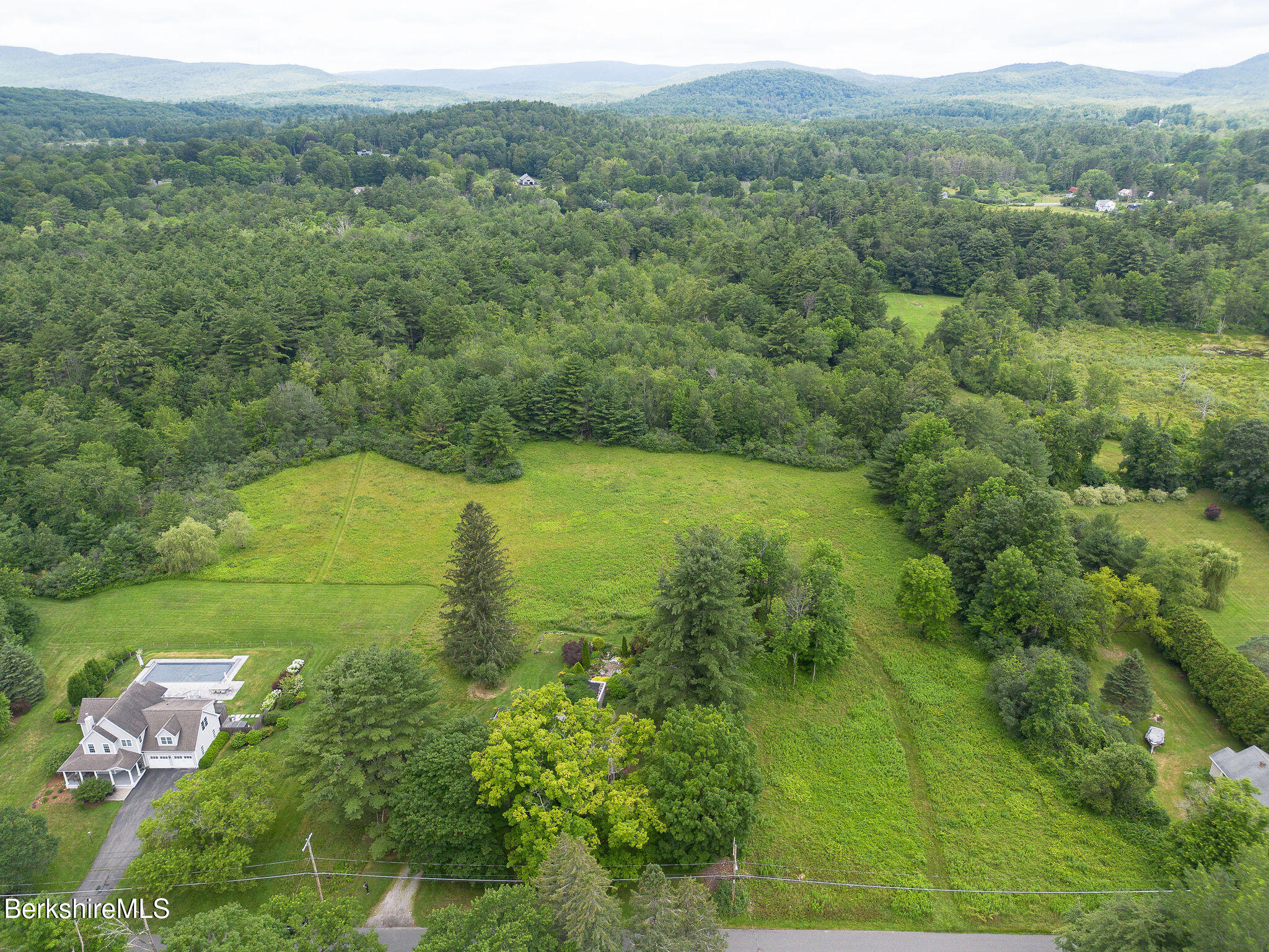 18 Goodrich Street Stockbridge, MA 01262 - Photo 61 of 63 a view of a lake with a yard