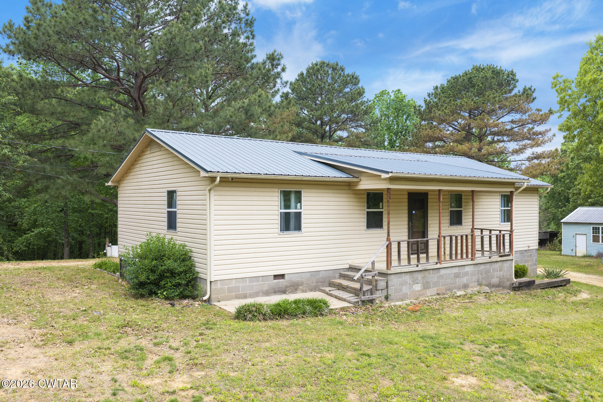 2827 Chapel Hill Road McKenzie, TN 38201 - Photo 1 of 40 a view of a house with a yard and plants