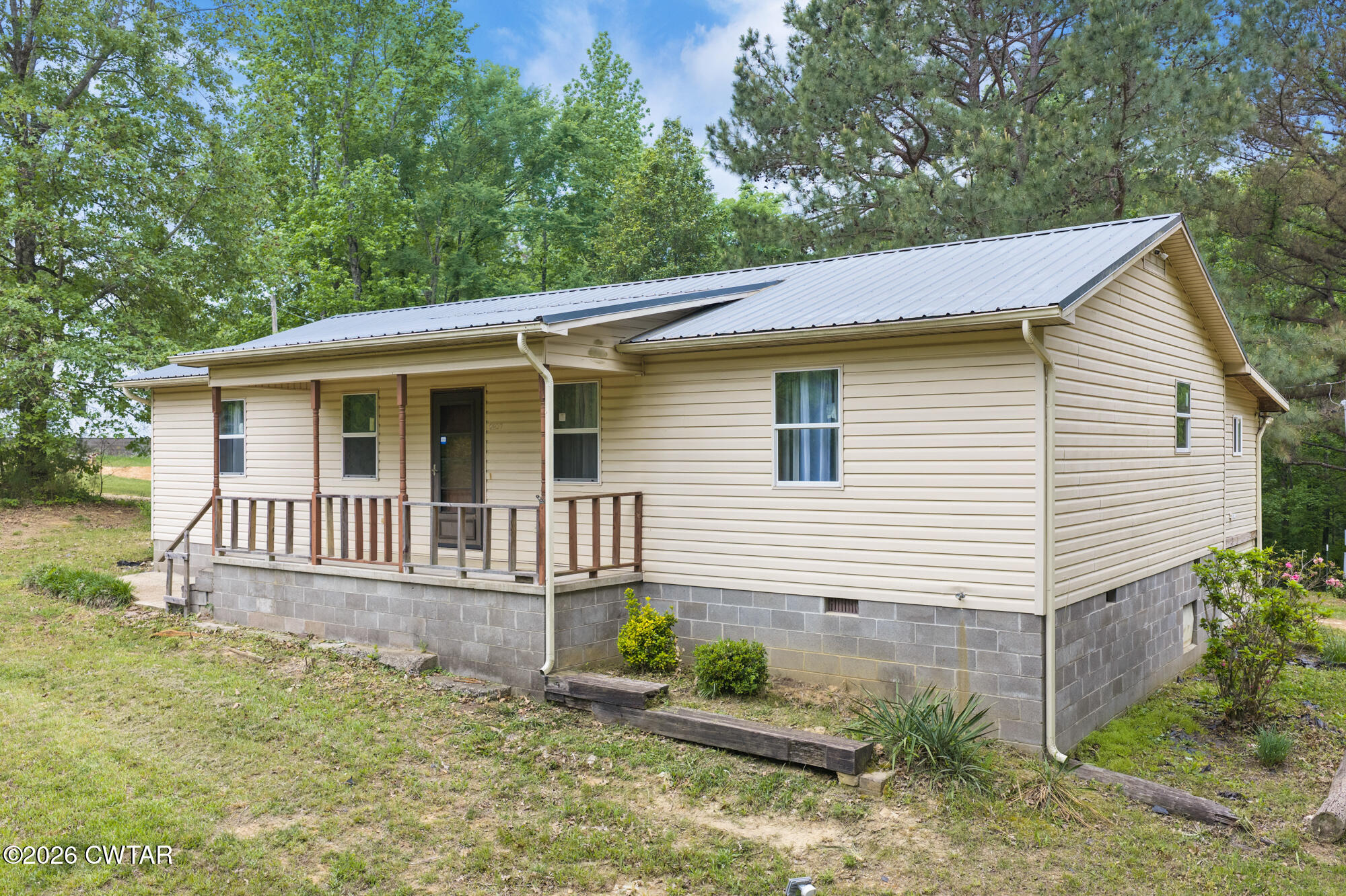 2827 Chapel Hill Road McKenzie, TN 38201 - Photo 2 of 40 a view of a house with a yard and plants