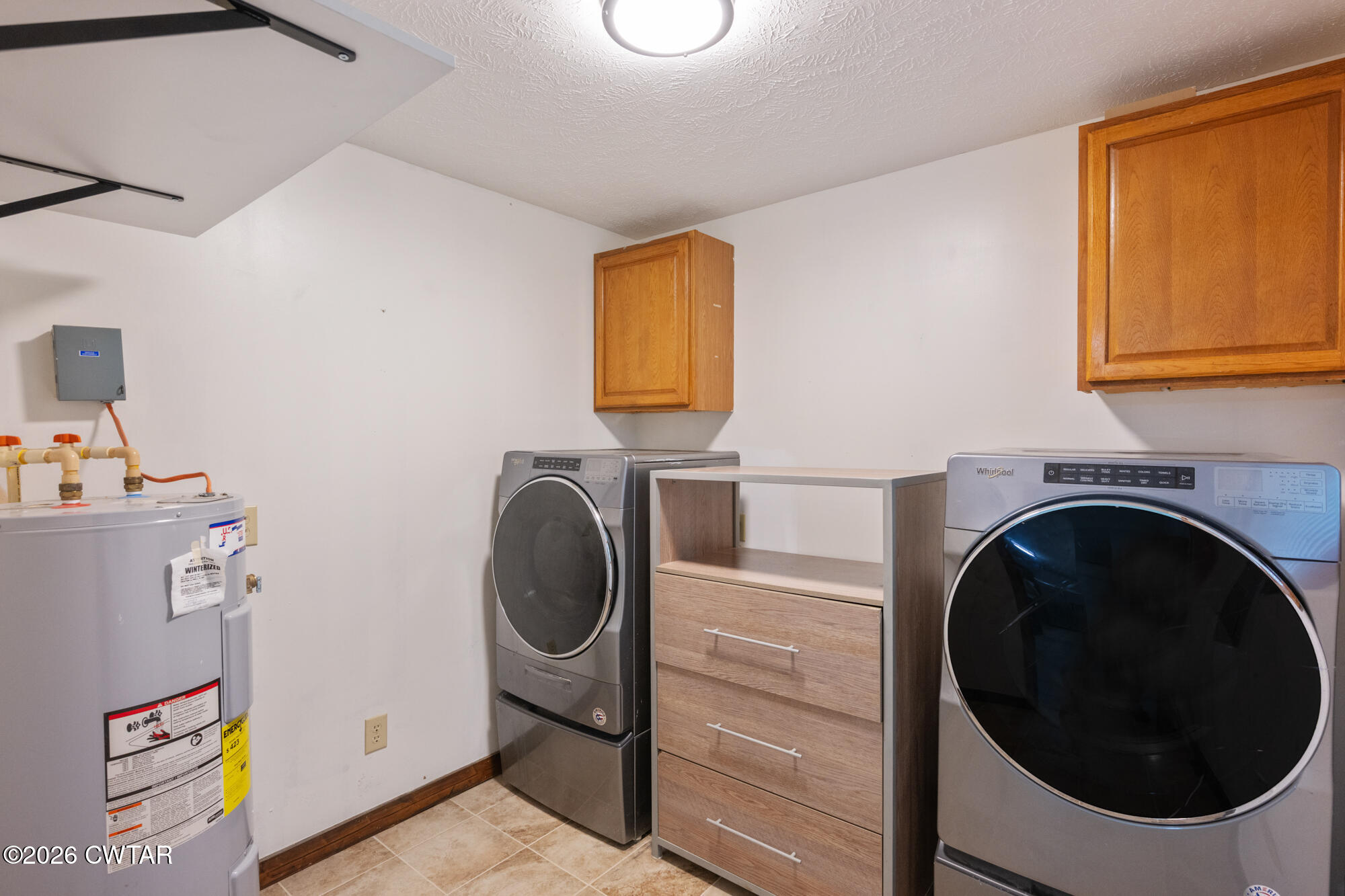 2827 Chapel Hill Road McKenzie, TN 38201 - Photo 24 of 40 a utility room with dryer and washer