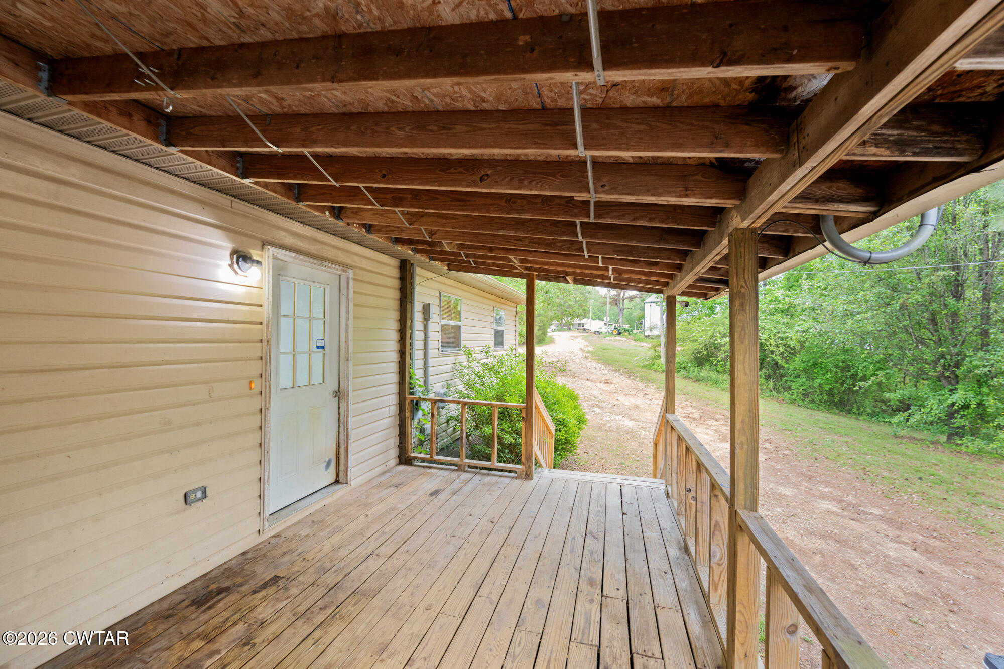 2827 Chapel Hill Road McKenzie, TN 38201 - Photo 37 of 40 a view of porch with wooden floor
