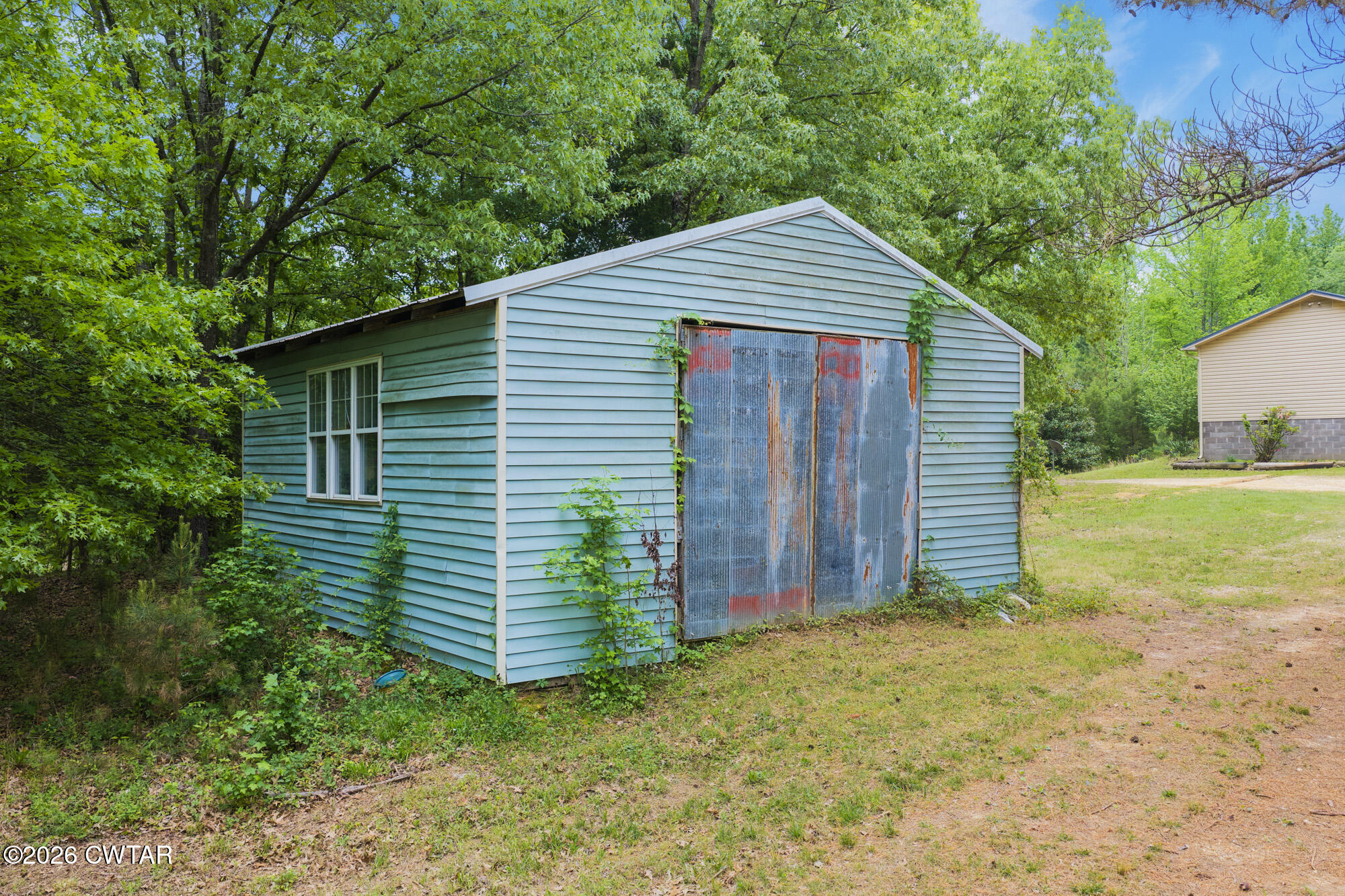 2827 Chapel Hill Road McKenzie, TN 38201 - Photo 38 of 40 a view of a house with a yard