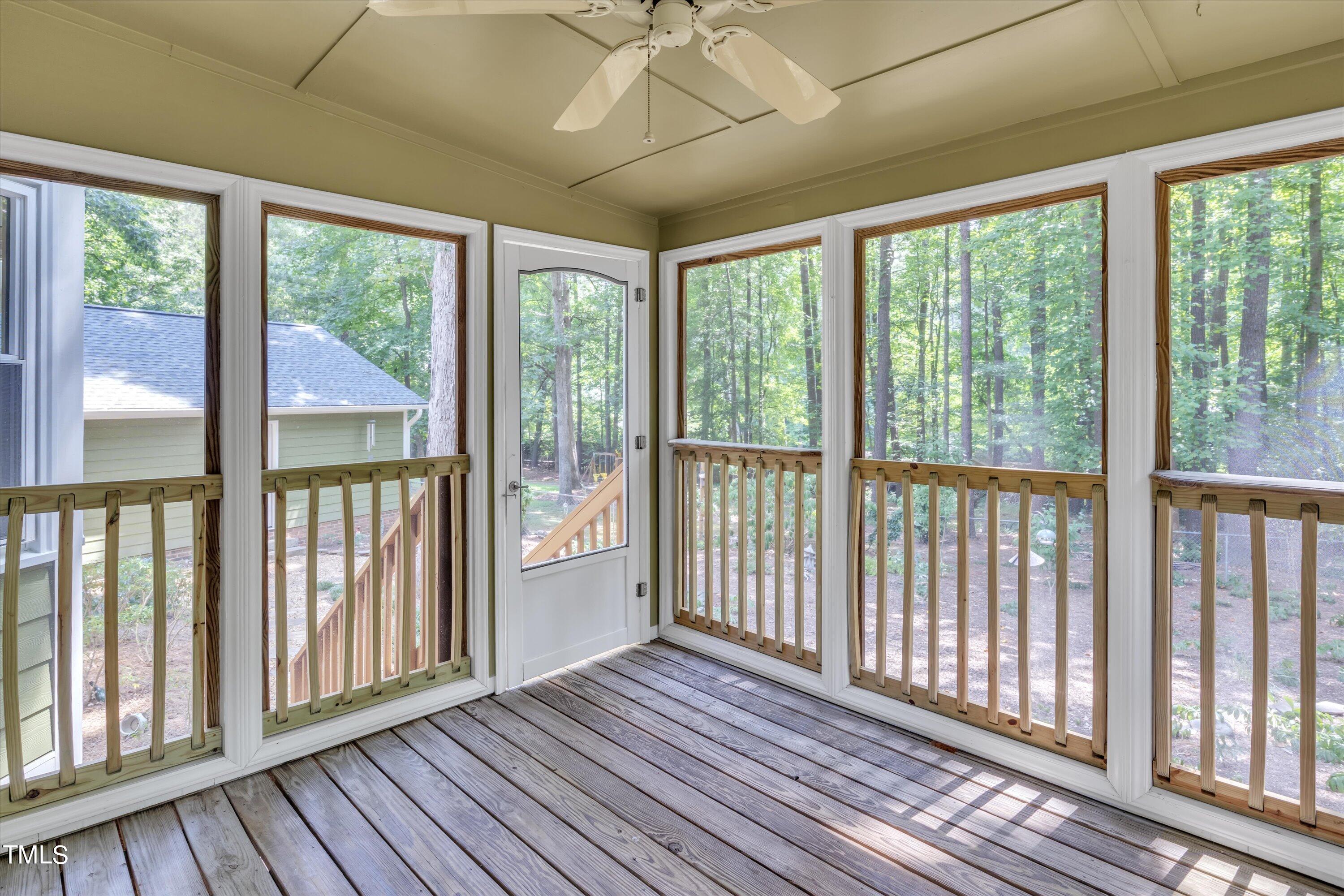 9208 Tree Meadow Lane Raleigh, NC 27603 - Photo 43 of 61 a view of a room with wooden floor and balcony