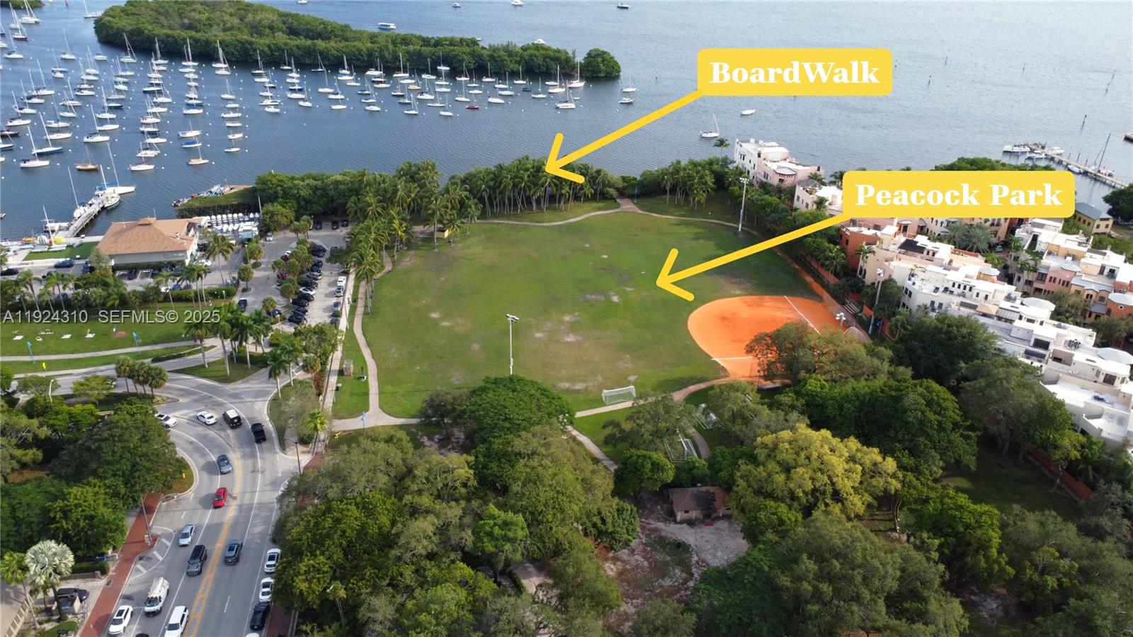 2977 McFarlane Road, Unit 9 Miami, FL 33133 - Photo 39 of 41 an aerial view of a houses with swimming pool