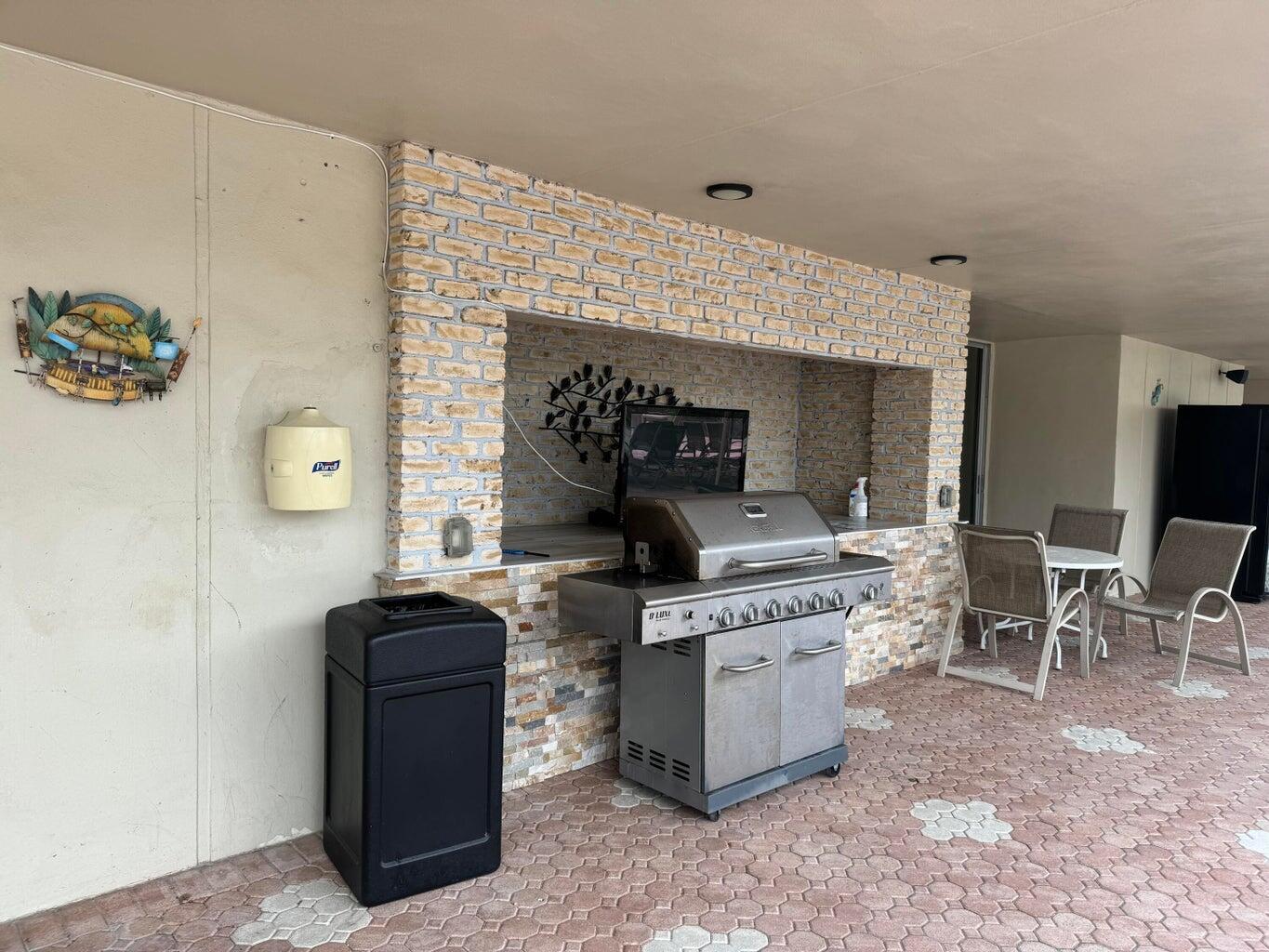 33 Abbey Lane, Unit 106 Delray Beach, FL 33446 - Photo 30 of 35 Abbey grill