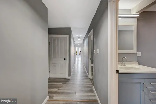 a view of a bathroom from the hallway