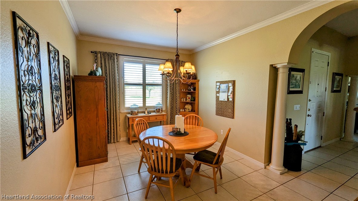 2120 Jack Smith Road Zolfo Springs, FL 33890 - Photo 16 of 36 a dining room with furniture and window