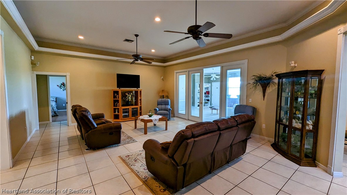 2120 Jack Smith Road Zolfo Springs, FL 33890 - Photo 19 of 36 a living room with furniture and a flat screen tv